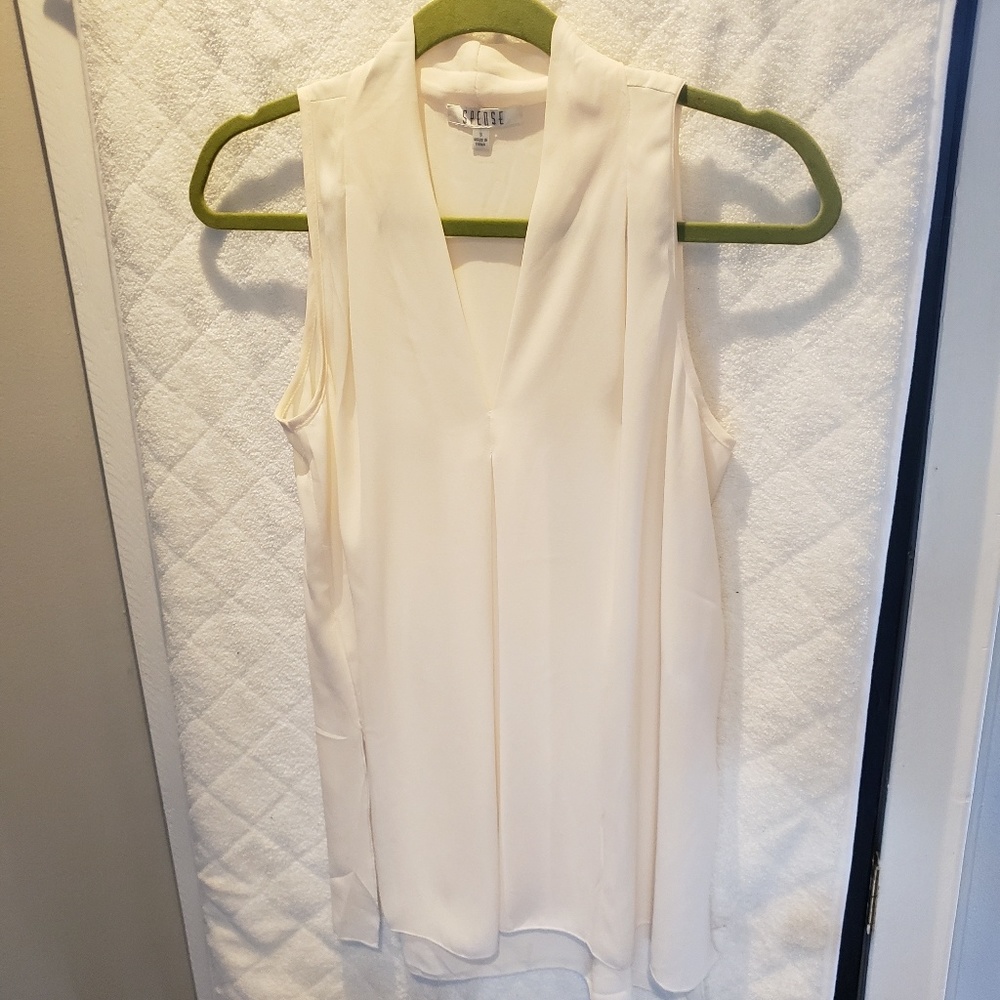 Ivory sleeveless blouse